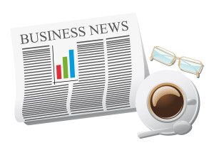 newspaper and cup of coffee