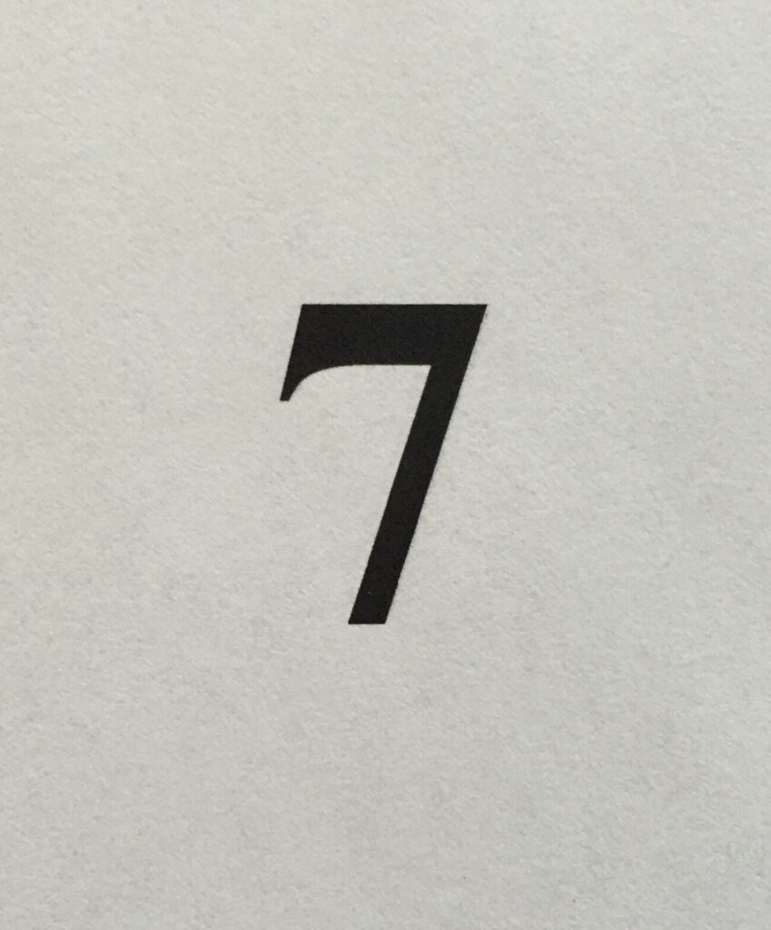 Large number 7 representing seven practical steps for filing your income tax return